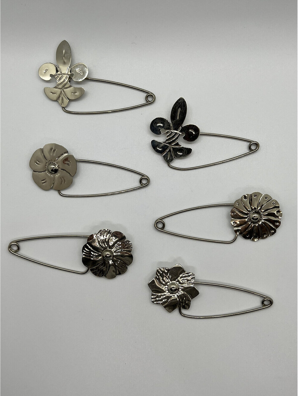 Flower or Fleur de Lis Silver Alpaca Brooch. Artisan made in Argentina.